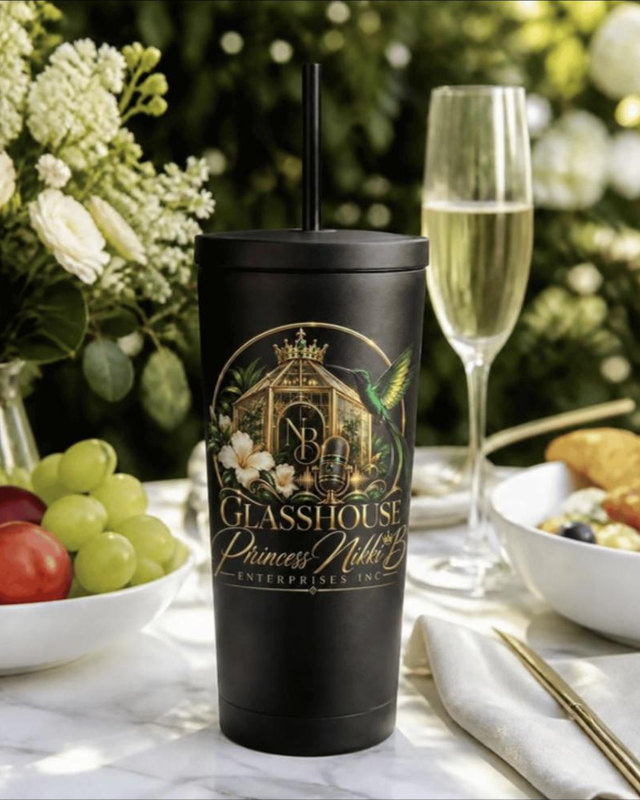 The Glasshouse Tumbler: matte black insulated tumbler with straw and the Glasshouse logo in gold